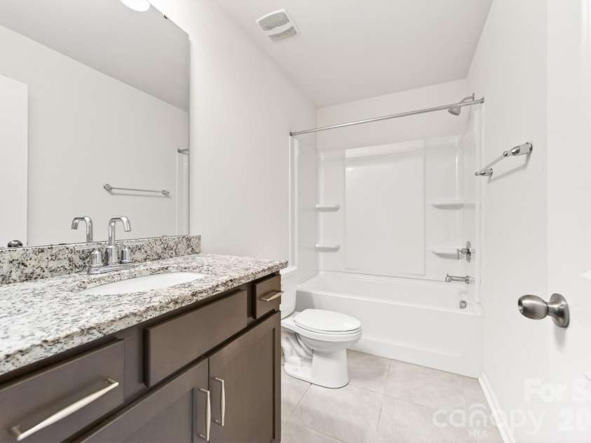 5972 Redwood Pine Road, Concord, NC 28027.  MLS# CAR4369260, YatesRealty ID 27977. Full bath located right outside bedroom #3