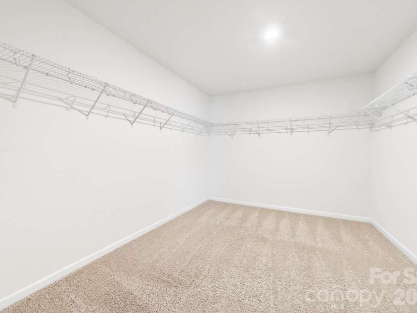 5972 Redwood Pine Road, Concord, NC 28027.  MLS# CAR4369260, YatesRealty ID 27977. LARGE walk in closet for primary