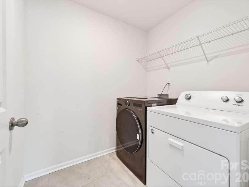 5972 Redwood Pine Road, Concord, NC 28027.  MLS# CAR4369260, YatesRealty ID 27977. Laundry room located on the upper floor