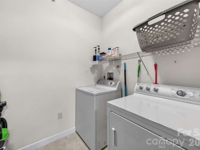 11921 Ridgeway Park Drive, Charlotte, NC 28277.  MLS# CAR4385924, YatesRealty ID 27979. Large Laundry With Lots of Extra Storage Space