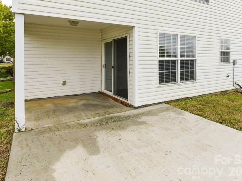 11927 Cheviott Hill Lane, Charlotte, NC 28213.  MLS# CAR4389997, YatesRealty ID 27980. Additional patio area