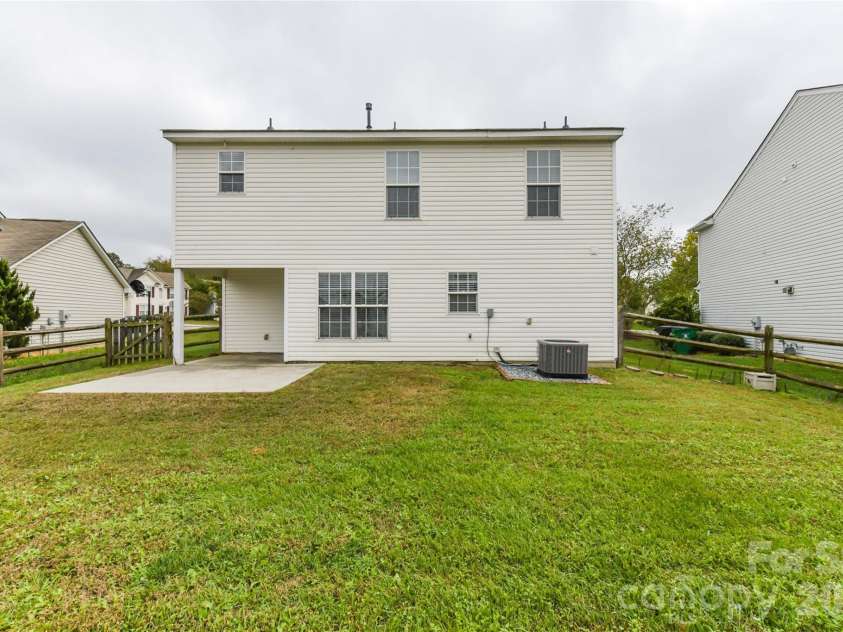 11927 Cheviott Hill Lane, Charlotte, NC 28213.  MLS# CAR4389997, YatesRealty ID 27980. Large backyard
