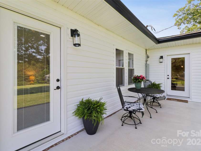 37598 Mountain Creek Road, New London, NC 28127.  MLS# CAR4258380, YatesRealty ID 27983. Back Patio