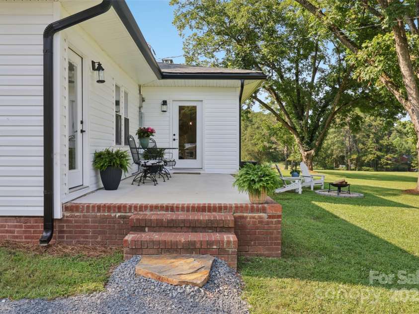 37598 Mountain Creek Road, New London, NC 28127.  MLS# CAR4258380, YatesRealty ID 27983. Back Patio