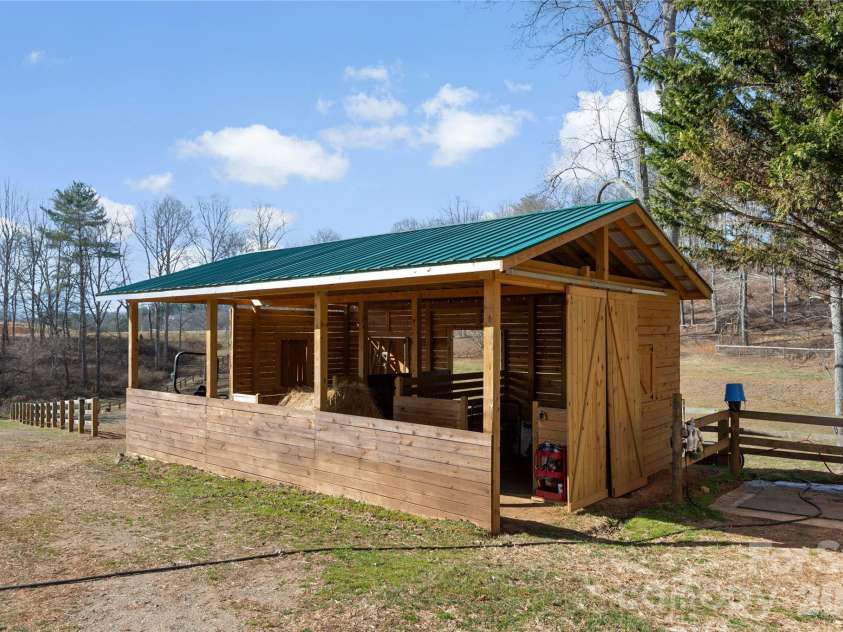 1552 Bear Creek Road, Leicester, NC 28748.  MLS# CAR4340462, YatesRealty ID 2799. Barn #1 -5 stalls in total! 
