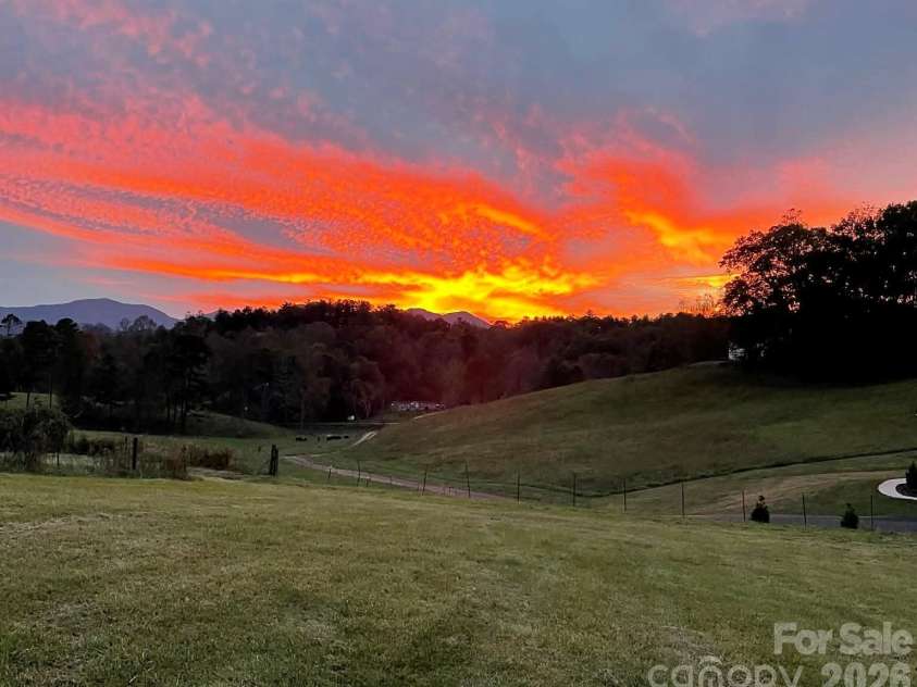 1552 Bear Creek Road, Leicester, NC 28748.  MLS# CAR4340462, YatesRealty ID 2799. Glorious sunsets! 