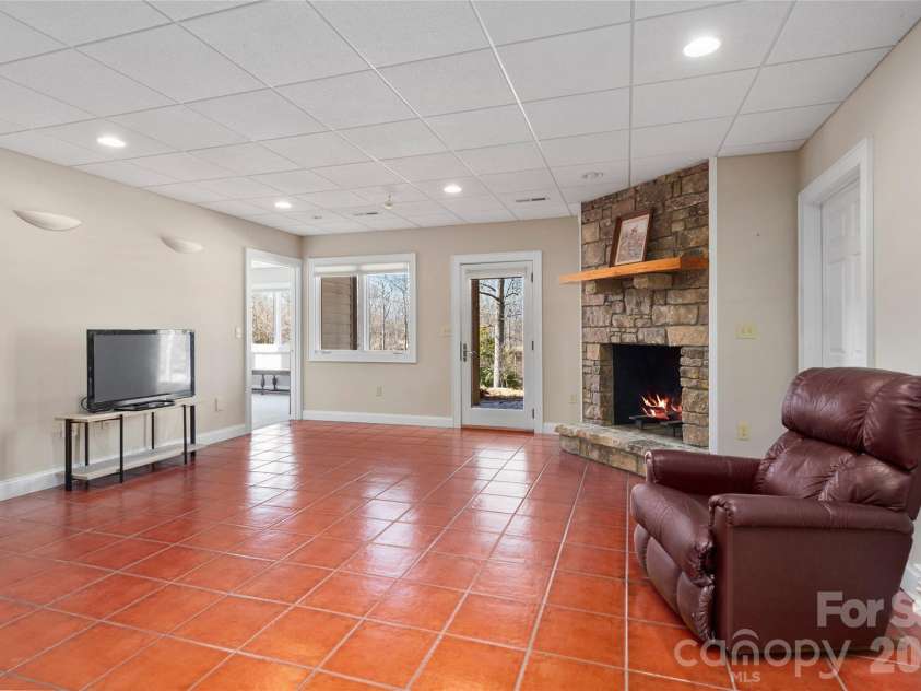 1552 Bear Creek Road, Leicester, NC 28748.  MLS# CAR4340462, YatesRealty ID 2799. Lower level living space 