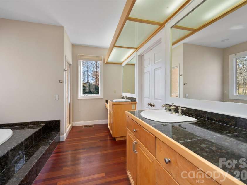 1552 Bear Creek Road, Leicester, NC 28748.  MLS# CAR4340462, YatesRealty ID 2799. Spacious bath w/double sinks! 