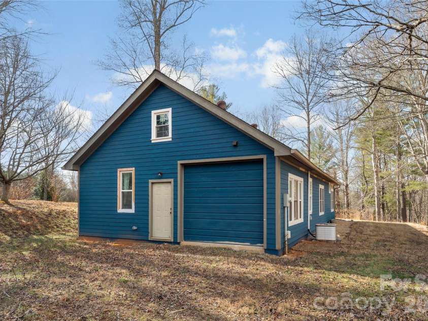 1552 Bear Creek Road, Leicester, NC 28748.  MLS# CAR4340462, YatesRealty ID 2799. There is even a garage! 