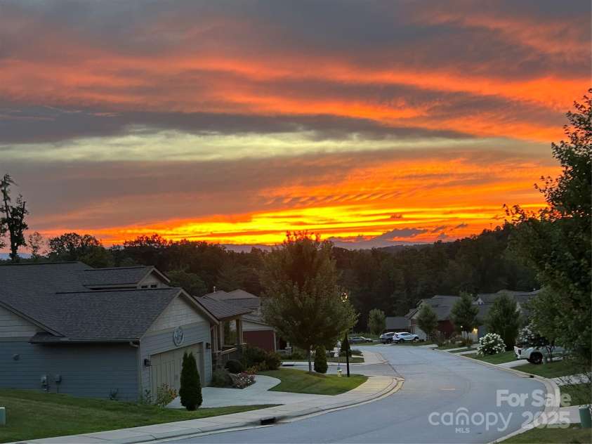 53 Loftin Street, Weaverville, NC 28787.  MLS# CAR4278510, YatesRealty ID 27991. Sunset from the front porch