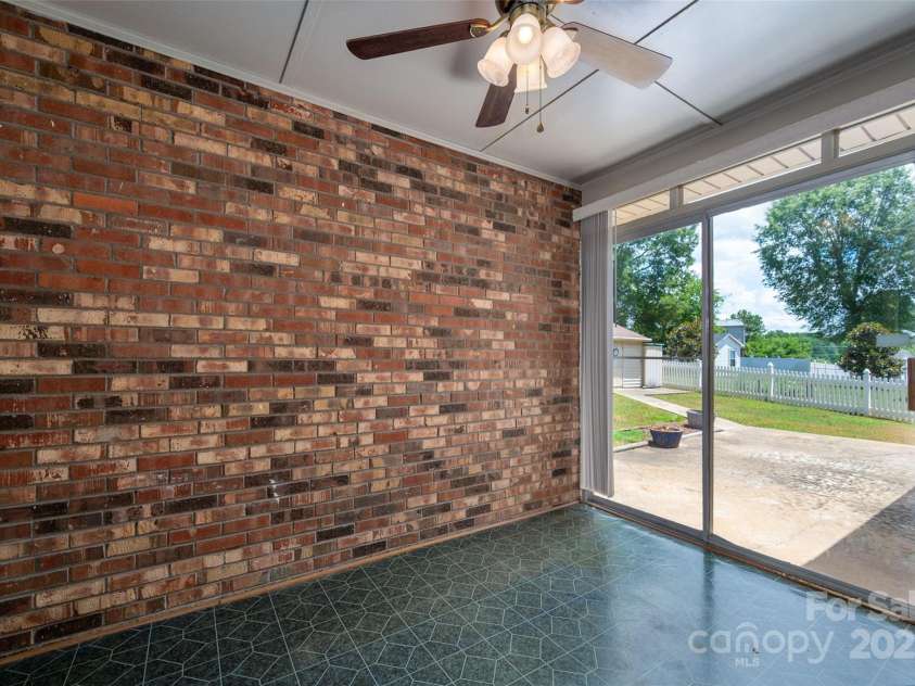1536 Anderson Street, Gastonia, NC 28054.  MLS# CAR4283379, YatesRealty ID 27992. Glass Enclosed Porch 1
