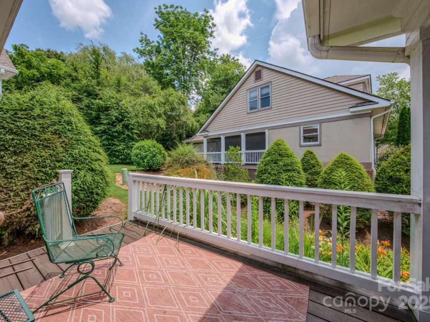 8 Creekside Way, Asheville, NC 28804.  MLS# CAR4275736, YatesRealty ID 28001. Rear Patio / Off Screened Porch