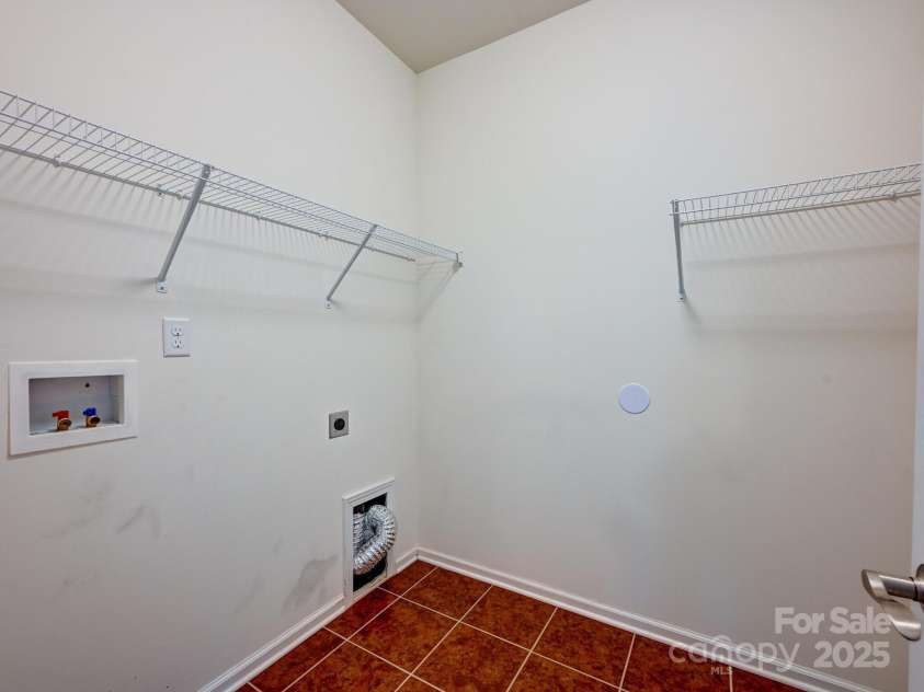 56 Brown Street, Weaverville, NC 28787.  MLS# CAR4284270, YatesRealty ID 28005. Laundry room