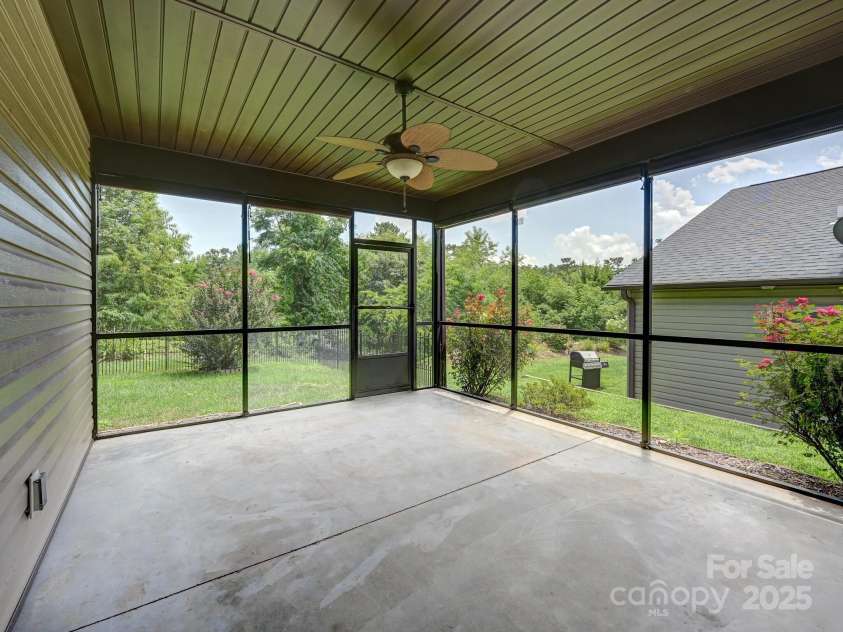 56 Brown Street, Weaverville, NC 28787.  MLS# CAR4284270, YatesRealty ID 28005. Screened in back porch