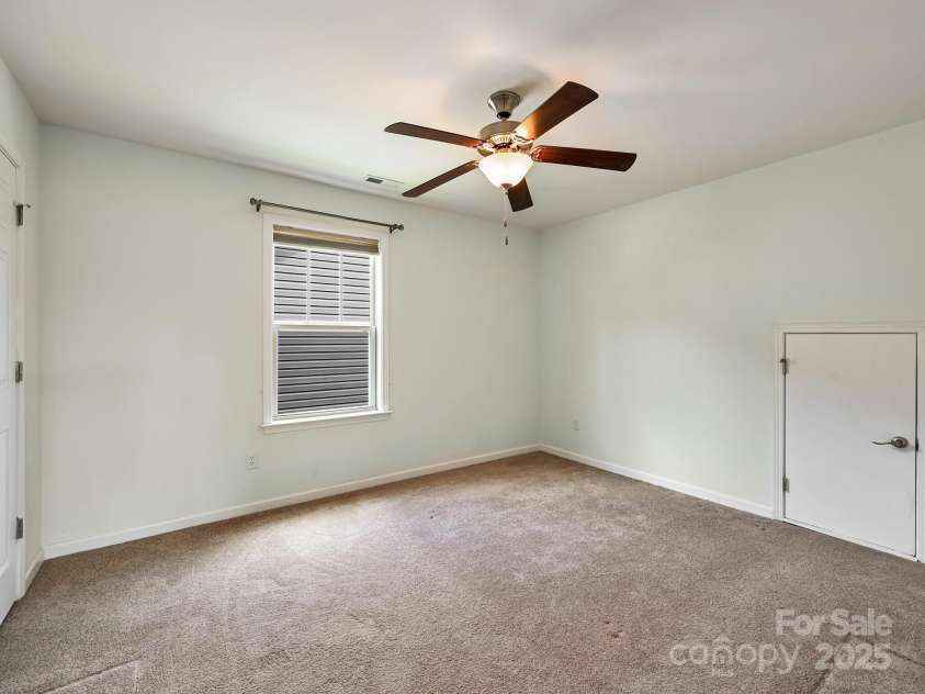 56 Brown Street, Weaverville, NC 28787.  MLS# CAR4284270, YatesRealty ID 28005. Upstairs bedroom