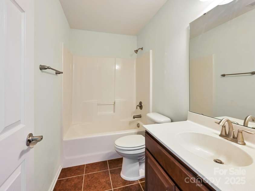 56 Brown Street, Weaverville, NC 28787.  MLS# CAR4284270, YatesRealty ID 28005. Upstairs full bath