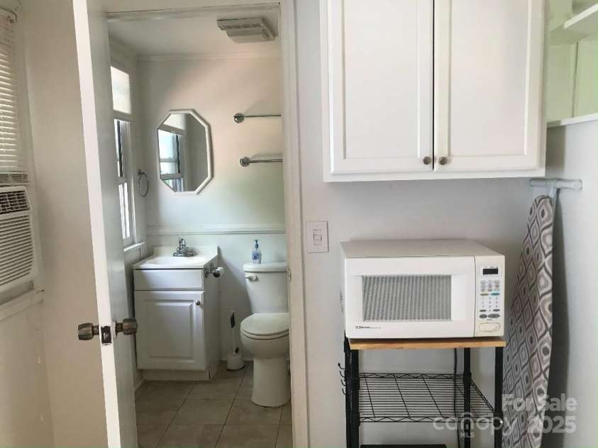 209 Edgewood Drive, Wingate, NC 28174.  MLS# CAR4285232, YatesRealty ID 28008. 2LQt Bathroom