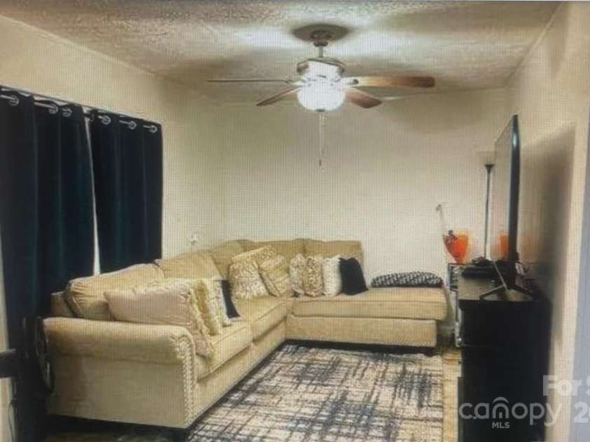 209 Edgewood Drive, Wingate, NC 28174.  MLS# CAR4285232, YatesRealty ID 28008. 2LQt Den