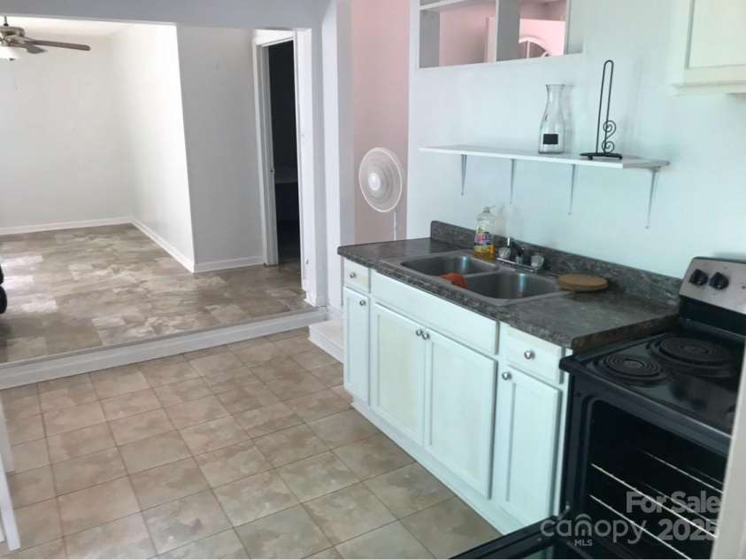 209 Edgewood Drive, Wingate, NC 28174.  MLS# CAR4285232, YatesRealty ID 28008. 2LQt Kitchen