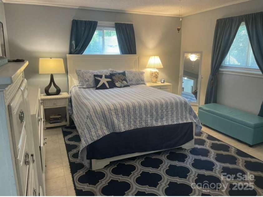 209 Edgewood Drive, Wingate, NC 28174.  MLS# CAR4285232, YatesRealty ID 28008. Main Bedroom