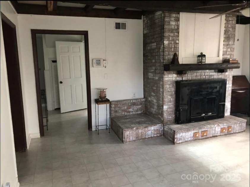 209 Edgewood Drive, Wingate, NC 28174.  MLS# CAR4285232, YatesRealty ID 28008. Main Den