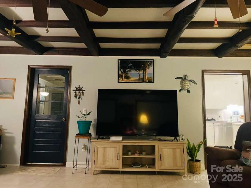 209 Edgewood Drive, Wingate, NC 28174.  MLS# CAR4285232, YatesRealty ID 28008. Main Den