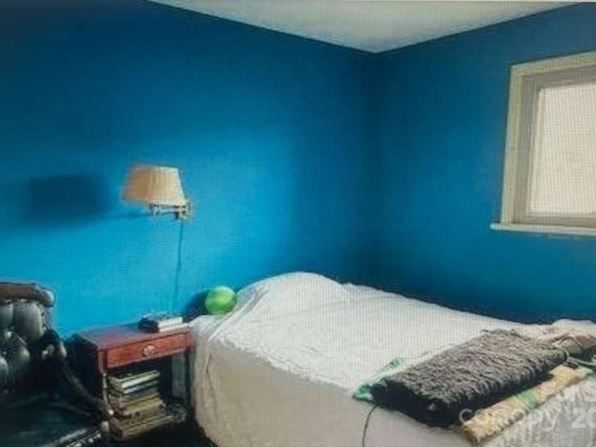 209 Edgewood Drive, Wingate, NC 28174.  MLS# CAR4285232, YatesRealty ID 28008. Upper Bedroom