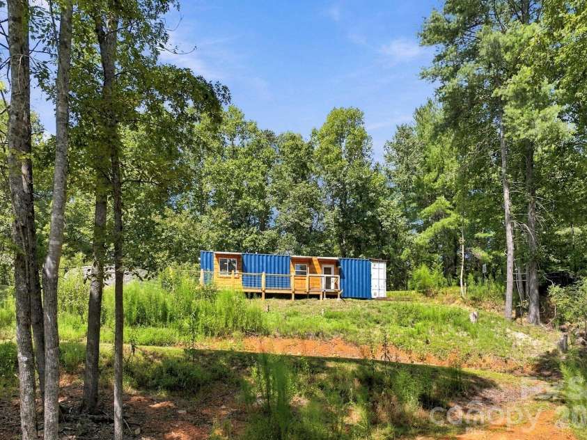 678 Forest Lake Heights Drive, Nebo, NC 28761.  MLS# CAR4424103, YatesRealty ID 28013. Container home on almost 4 acres