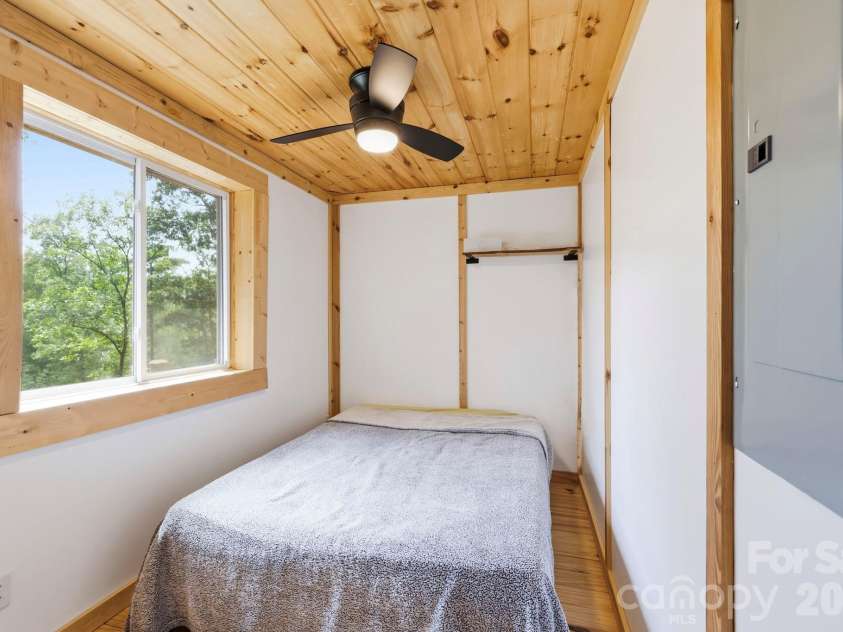 678 Forest Lake Heights Drive, Nebo, NC 28761.  MLS# CAR4424103, YatesRealty ID 28013. Looking into the bedroom
