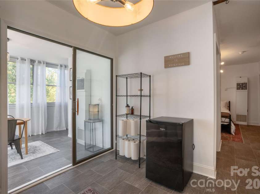 10 Washington Avenue, Asheville, NC 28804.  MLS# CAR4390227, YatesRealty ID 28015. Rear unit