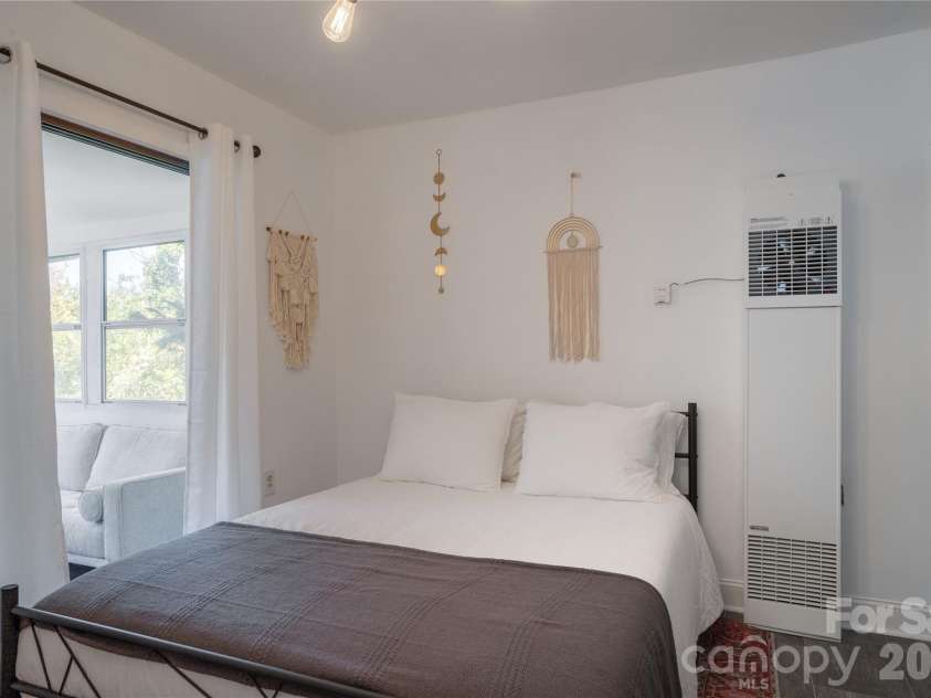 10 Washington Avenue, Asheville, NC 28804.  MLS# CAR4390227, YatesRealty ID 28015. Rear unit