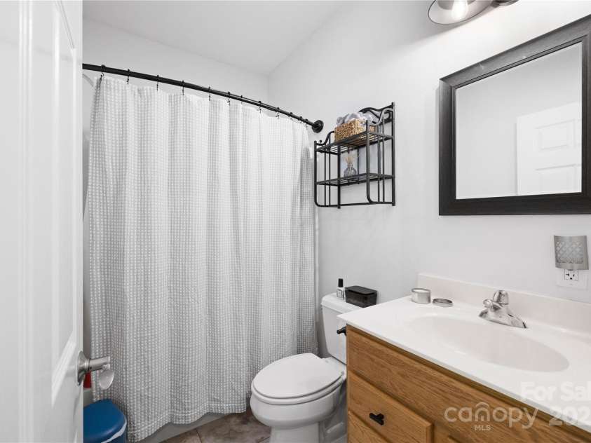 1308 Bell Mountain Road, Zirconia, NC 28790.  MLS# CAR4317514, YatesRealty ID 2802. Main level hall bath 