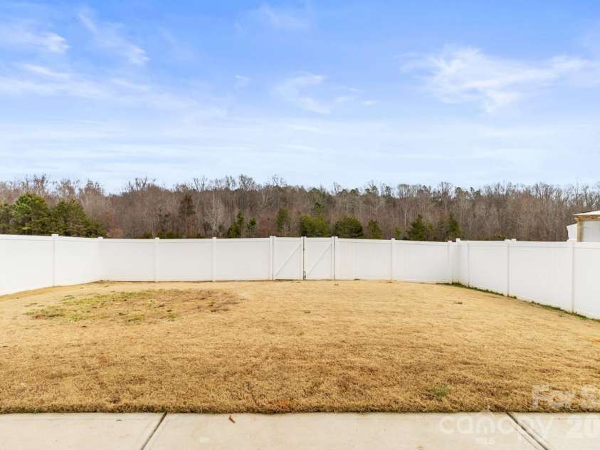 142 Fairfield Drive, Troutman, NC 28166.  MLS# CAR4349688, YatesRealty ID 2802. Fenced Backyard