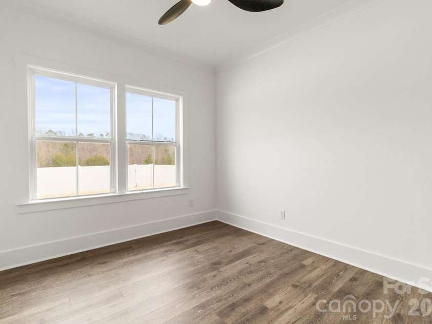 142 Fairfield Drive, Troutman, NC 28166.  MLS# CAR4349688, YatesRealty ID 2802. Main Floor Bedroom