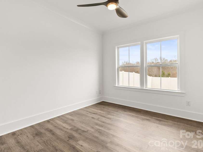 142 Fairfield Drive, Troutman, NC 28166.  MLS# CAR4349688, YatesRealty ID 2802. Main Floor Bedroom