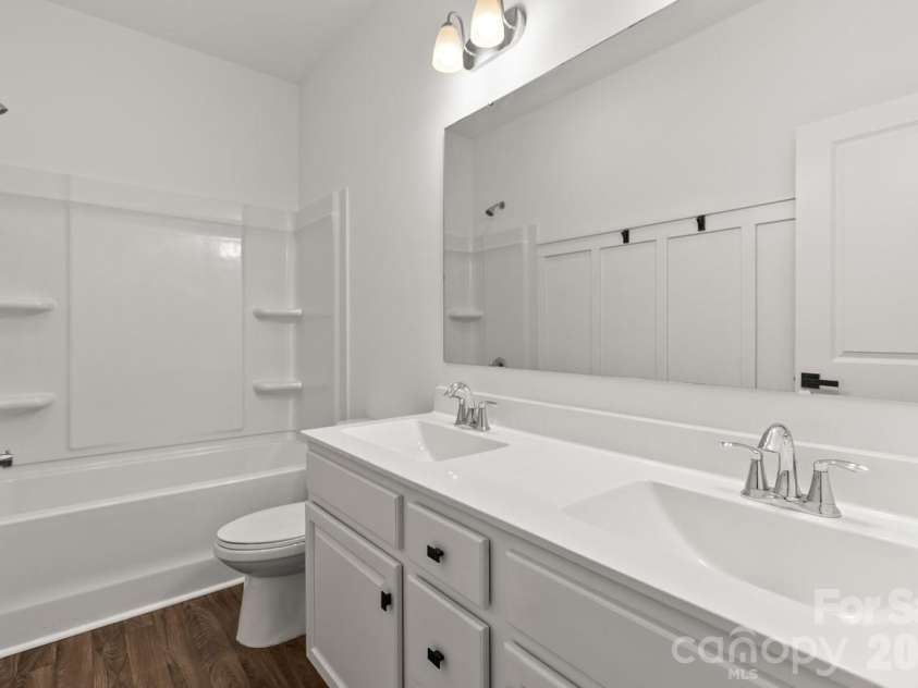 142 Fairfield Drive, Troutman, NC 28166.  MLS# CAR4349688, YatesRealty ID 2802. Upper Level Hall Bathroom