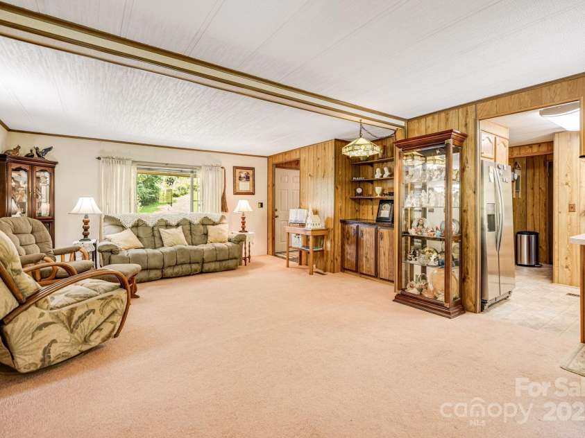 582 Lewis Branch Road, Marshall, NC 28753.  MLS# CAR4284450, YatesRealty ID 28023. 