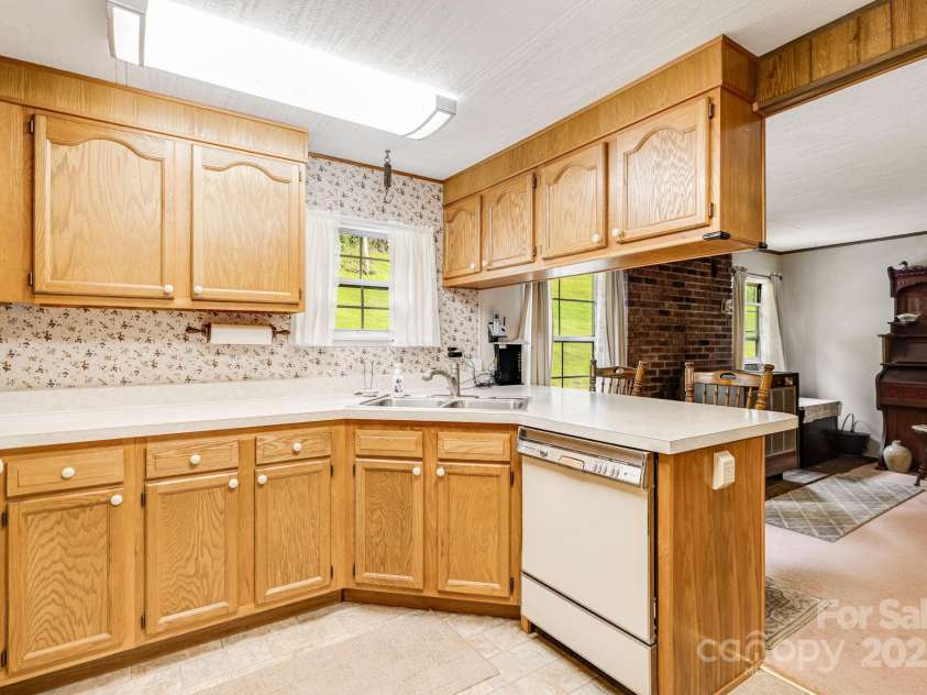 582 Lewis Branch Road, Marshall, NC 28753.  MLS# CAR4284450, YatesRealty ID 28023. 