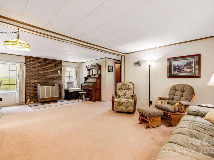 582 Lewis Branch Road, Marshall, NC 28753.  MLS# CAR4284450, YatesRealty ID 28023. 