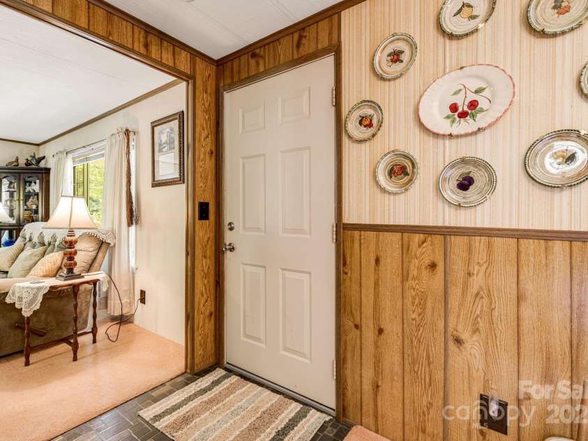 582 Lewis Branch Road, Marshall, NC 28753.  MLS# CAR4284450, YatesRealty ID 28023. 