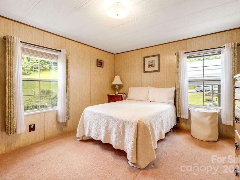 582 Lewis Branch Road, Marshall, NC 28753.  MLS# CAR4284450, YatesRealty ID 28023. 