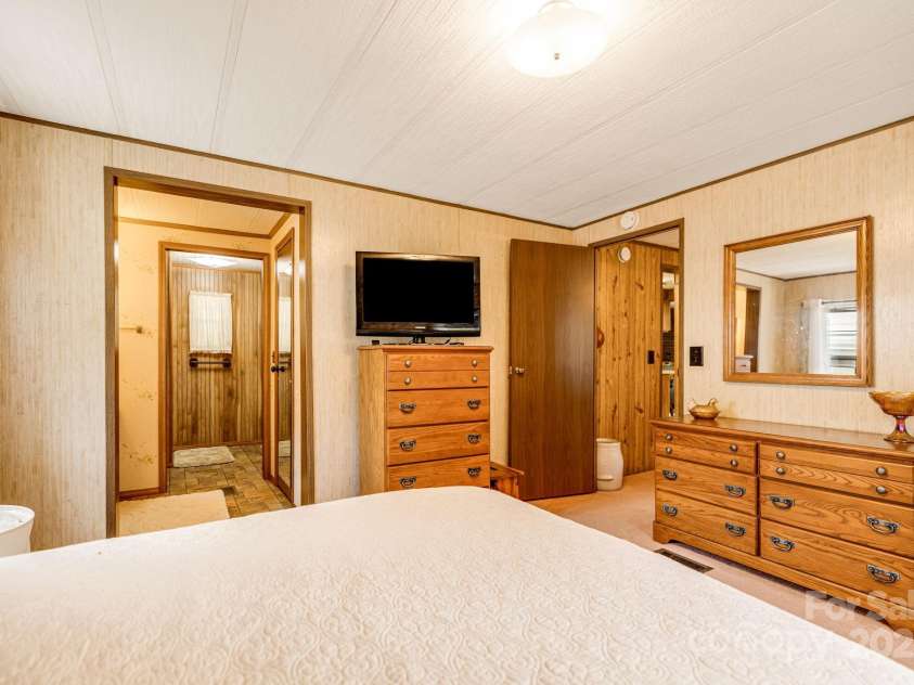 582 Lewis Branch Road, Marshall, NC 28753.  MLS# CAR4284450, YatesRealty ID 28023. 