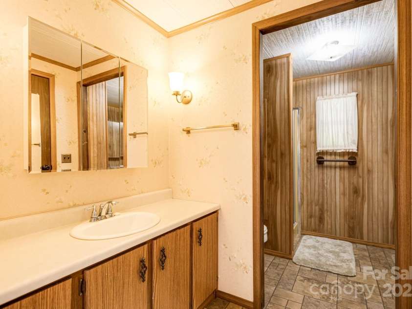 582 Lewis Branch Road, Marshall, NC 28753.  MLS# CAR4284450, YatesRealty ID 28023. 