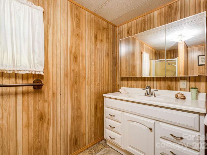 582 Lewis Branch Road, Marshall, NC 28753.  MLS# CAR4284450, YatesRealty ID 28023. 