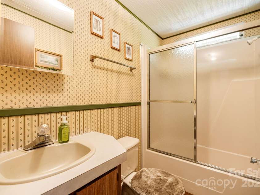 582 Lewis Branch Road, Marshall, NC 28753.  MLS# CAR4284450, YatesRealty ID 28023. 