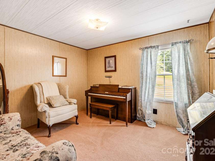 582 Lewis Branch Road, Marshall, NC 28753.  MLS# CAR4284450, YatesRealty ID 28023. 