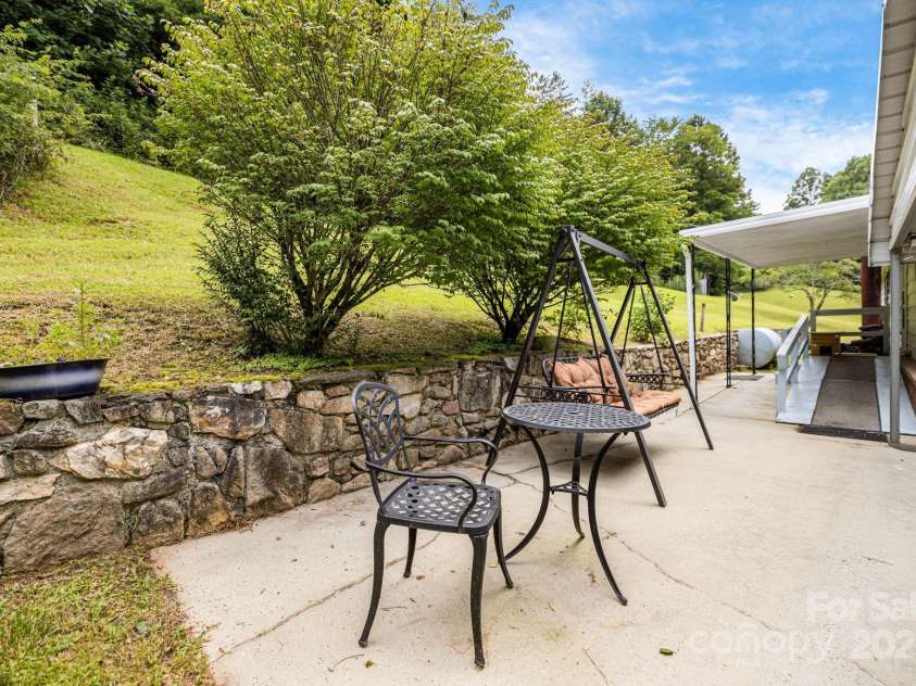 582 Lewis Branch Road, Marshall, NC 28753.  MLS# CAR4284450, YatesRealty ID 28023. 