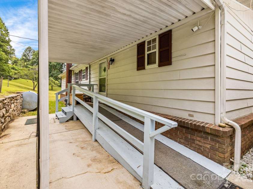 582 Lewis Branch Road, Marshall, NC 28753.  MLS# CAR4284450, YatesRealty ID 28023. 