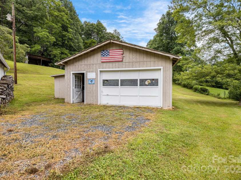 582 Lewis Branch Road, Marshall, NC 28753.  MLS# CAR4284450, YatesRealty ID 28023. 