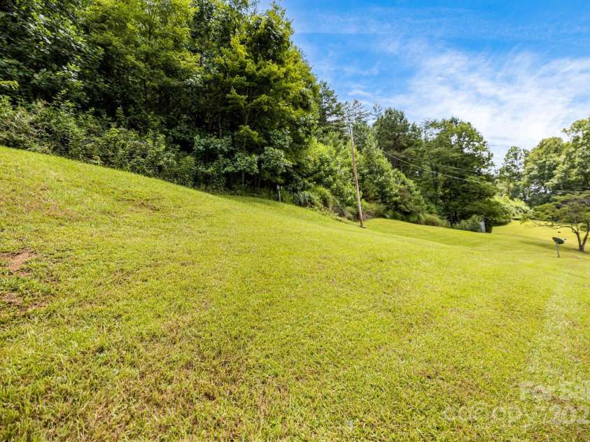 582 Lewis Branch Road, Marshall, NC 28753.  MLS# CAR4284450, YatesRealty ID 28023. 
